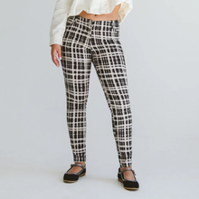Load image into Gallery viewer, Plaid pants worn by a person on a plain background
