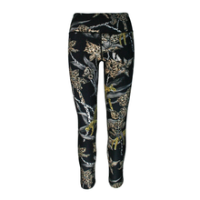 Load image into Gallery viewer, Black leggings with gold and white floral pattern on a white background

