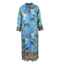 Load image into Gallery viewer, Long, patterned shirt dress with animal and abstract designs on a white background
