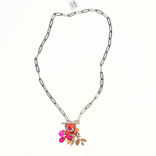 Load image into Gallery viewer, Necklace with colorful pendant on a white background
