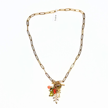 Load image into Gallery viewer, Gold chain necklace with colorful pendant on a white background
