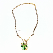 Load image into Gallery viewer, Gold necklace with green gemstone pendant on a white background
