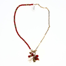 Load image into Gallery viewer, Necklace with red beads and gold chain on a white background
