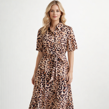 Load image into Gallery viewer, Woman wearing a leopard print dress on a white background
