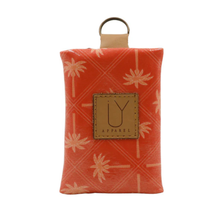 Load image into Gallery viewer, Keyring pouch with palm tree pattern and IY Apparel' brand label on a white background
