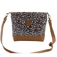 Load image into Gallery viewer, Crossbody bag with leopard print pattern and brown accents on a white background
