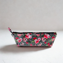Load image into Gallery viewer, Floral patterned cosmetic bag on a white background
