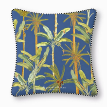 Load image into Gallery viewer, Cushion with tropical palm tree design on a blue background
