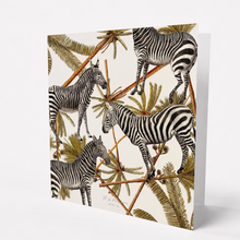 Load image into Gallery viewer, Greeting card with zebras and palm trees on a beige background
