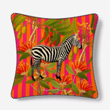 Load image into Gallery viewer, Decorative cushion with a zebra and tropical plants design on a pink and orange striped background.
