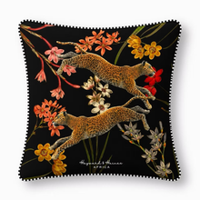 Load image into Gallery viewer, Decorative pillow with leopards and flowers on a black background
