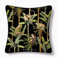 Load image into Gallery viewer, Decorative pillow with monkey and jungle design on a black background
