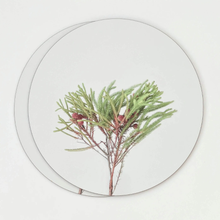 Load image into Gallery viewer, Round placemats with a fynbos branch design on a white background

