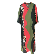 Load image into Gallery viewer, A women's midi kaftan dress featuring a bold color-blocked pattern of olive green, red, black, and leopard print panels, with a split neckline and drawstring.
