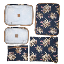 Load image into Gallery viewer, A set of four reusable fabric packing pods with a navy blue background and a beige and pink aloe pattern, arranged on a white background. 
