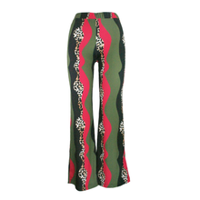 Load image into Gallery viewer, Colourful patterned Rush Luxe pants on a white background
