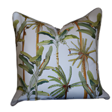 Load image into Gallery viewer, Decorative pillow with tropical leaf pattern on a white background
