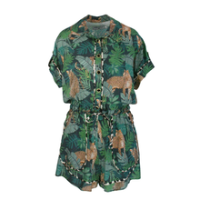 Load image into Gallery viewer, Green patterned Rush jumpsuit with animal and leaf design on a white background
