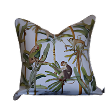 Load image into Gallery viewer, Decorative pillow with monkey and leaf pattern on a white background
