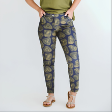 Load image into Gallery viewer, Person wearing blue patterned pants on a white background
