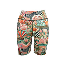 Load image into Gallery viewer, Colorful patterned short gym tights with a visible Rush logo 
